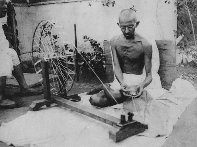 Gandhi spinning,swadeshi movement one ofGandhi's principles