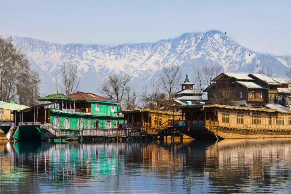View of Srinagar from the Dal lake in winter with houseboats and the Shah Hamadan mosque.