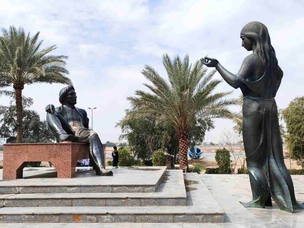 Thousand and one night group of statues along Abu Nawas in Baghdad