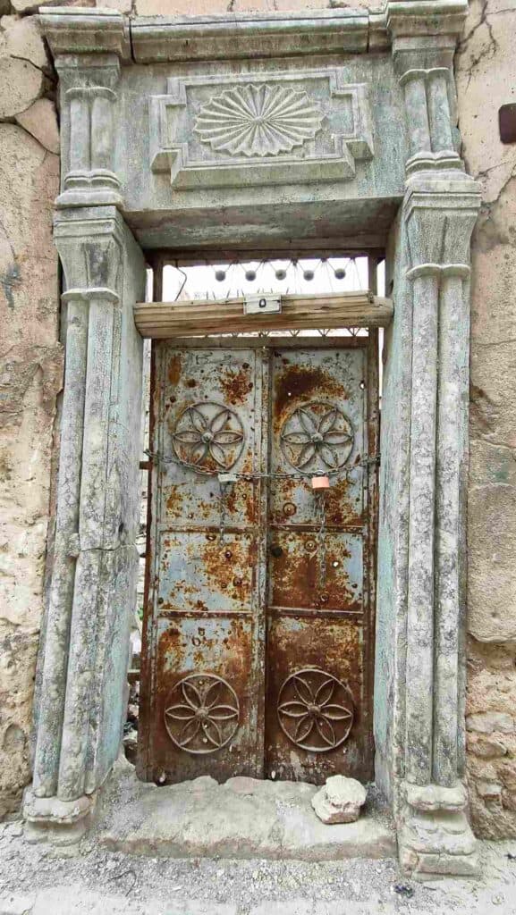Intricately carved door framed in Mosul Iraq