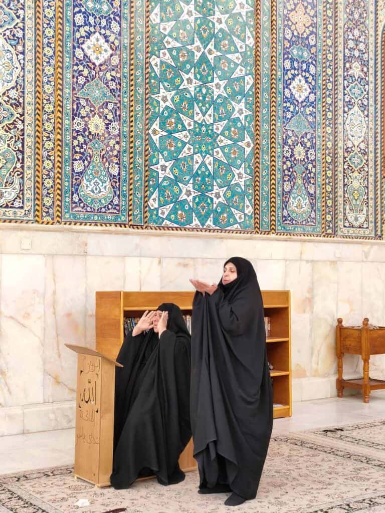 Women are praying in Al-Aksari mosque in Samarra